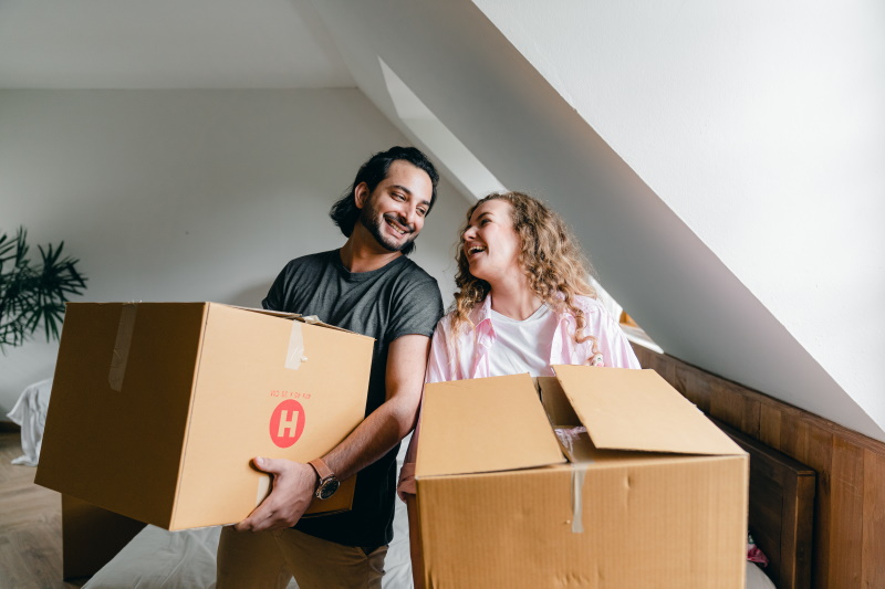 Canva Happy multiethnic couple moving in new apartment